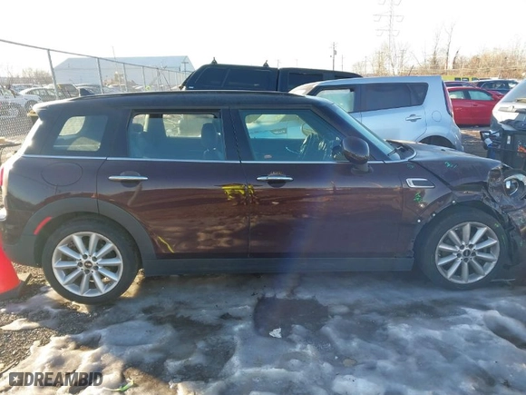 2016 MINI Cooper Clubman with VIN WMWLN5C50G2E29740, listed as a IAAI auction lot 41345976 with 67,124 mi miles. Bid and sale history available at carsss.com. Image 13.