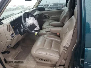 1999 GMC Yukon with VIN 1GKEK13R8XJ798496, listed as a Copart auction lot 81506634 with 117,726 mi miles and Salvage Title. Bid and sale history available at carsss.com. Image 7.