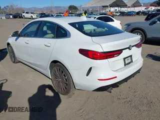 2023 BMW 2 Series 228i with VIN WBA53AK09P7M14294, listed as a IAAI auction lot 41368056 with 9,601 mi miles. Bid and sale history available at carsss.com. Image 3.