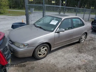 2000 Toyota Corolla VE with VIN 2T1BR12E2YC319804, listed as a IAAI auction lot 41895787 with 160,985 mi miles and . Bid and sale history available at DreamBid. Image 2.