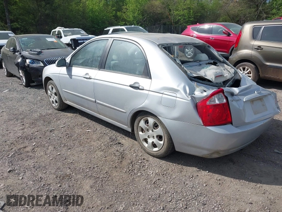 2005 Kia Spectra LX with VIN KNAFE121355203561, listed as a IAAI auction lot 41894533 with 32,889 mi miles. Bid and sale history available at carsss.com. Image 3.