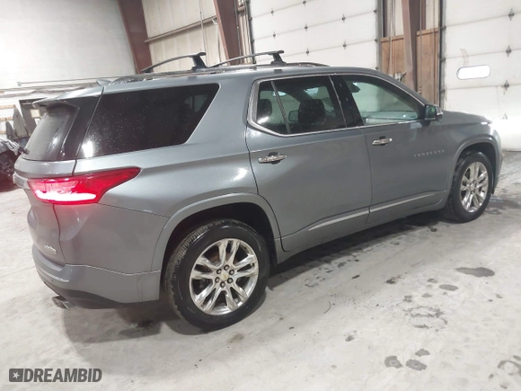 2018 Chevrolet Traverse High Country with VIN 1GNEVKKW1JJ156538, listed as a IAAI auction lot 41670997 with 99,345 mi miles. Bid and sale history available at carsss.com. Image 4.