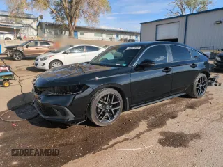 2023 Honda Civic Sport Touring z VIN 19XFL1H85PE402177, wystawiony jako Copart lot #52611605 z przebiegiem 56 306 mil mil oraz Szkoda całkowita • Salvage title. Historia ofert i sprzedaży dostępna na DreamBid. Obrazek 1.