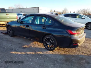 2022 BMW 3 Series 330i xDrive with VIN 3MW5R7J03N8C37885, listed as a IAAI auction lot 41018959 with 13,491 mi miles. Bid and sale history available at carsss.com. Image 3.