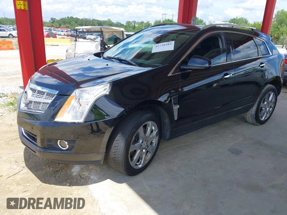 2012 Cadillac SRX Premium Collection z VIN 3GYFNCE36CS615725, wystawiony jako IAAI lot #42738584 z przebiegiem 156 625 mil mil oraz . Historia ofert i sprzedaży dostępna na DreamBid. Obrazek 17.