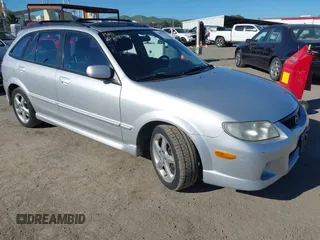 2002 Mazda Protege with VIN JM1BJ246X21467035, listed as a IAAI auction lot 41859444 with 150,585 mi miles and . Bid and sale history available at DreamBid. Image 1.