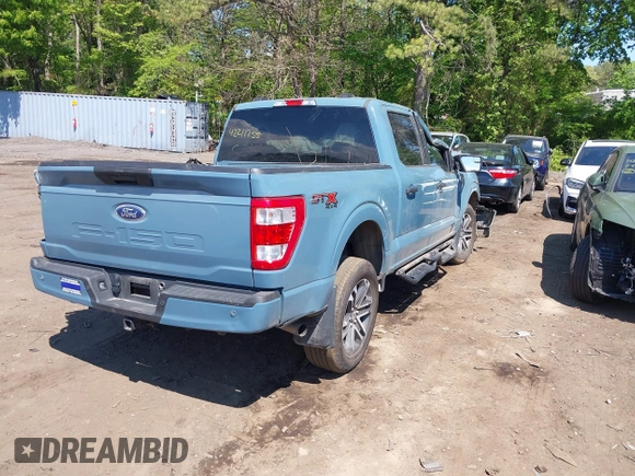 2023 Ford F-150 XL with VIN 1FTFW1E53PKD99214, listed as a IAAI auction lot 42211755 with 31 mi miles and . Bid and sale history available at DreamBid. Image 4.