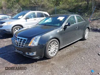 2012 Cadillac CTS Premium with VIN 1G6DP5E3XC0131943, listed as a IAAI auction lot 41747969 with 70,859 mi miles and . Bid and sale history available at DreamBid. Image 2.