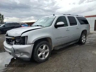 2013 Chevrolet Suburban LT with VIN 1GNSCJE07DR305437, listed as a Copart auction lot 55346605 with 160,518 mi miles and Salvage title. Bid and sale history available at DreamBid. Image 1.