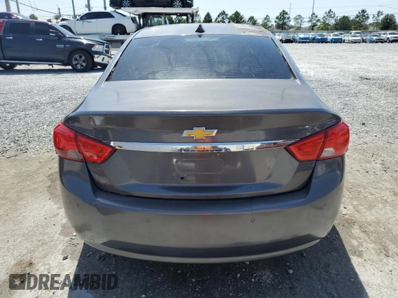 2014 Chevrolet Impala LT with VIN 2G1115SL2E9244163, listed as a Copart auction lot 57328675 with 136,548 mi miles and Salvage title. Bid and sale history available at DreamBid. Image 6.