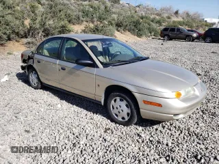 2002 Saturn SL z VIN 1G8ZH52872Z268617, wystawiony jako Copart lot #53747965 z przebiegiem Nie podano mil oraz Szkoda całkowita • Salvage title. Historia ofert i sprzedaży dostępna na DreamBid. Obrazek 4.