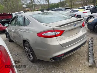 2015 Ford Fusion Titanium with VIN 3FA6P0K96FR180181, listed as a IAAI auction lot 41940248 with 63,120 mi miles. Bid and sale history available at carsss.com. Image 3.