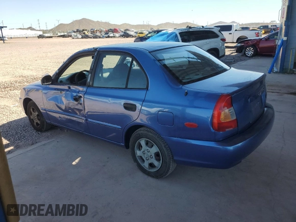 2002 Hyundai Accent GL with VIN KMHCG45C32U332833, listed as a Copart auction lot 66539644 with 69,763 mi miles and Salvage Title. Bid and sale history available at carsss.com. Image 2.