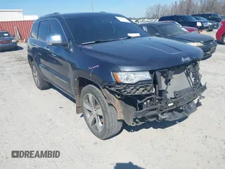 2014 Jeep Grand Cherokee Overland with VIN 1C4RJECG9EC522075, listed as a IAAI auction lot 41683670 with 1 mi miles. Bid and sale history available at carsss.com. Image 1.