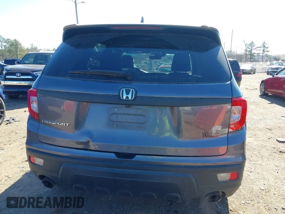 2019 Honda Passport EX-L with VIN 5FNYF7H54KB000467, listed as a IAAI auction lot 41342341 with 172,811 mi miles and . Bid and sale history available at carsss.com. Image 16.