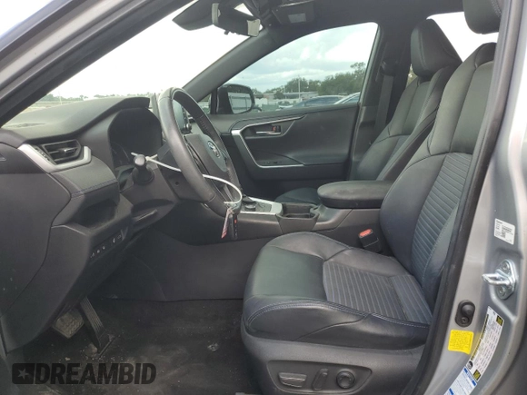 2021 Toyota RAV4 Hybrid XSE with VIN 2T3E6RFVXMW020561, listed as a Copart auction lot 64822005 with 39,434 mi miles and Salvage title. Bid and sale history available at DreamBid. Image 7.