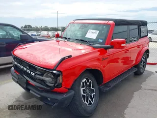 2022 Ford Bronco z VIN 1FMDE5DH7NLA98557, wystawiony jako IAAI lot #41746093 z przebiegiem 61 718 mil mil oraz . Historia ofert i sprzedaży dostępna na DreamBid. Obrazek 2.