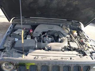 2020 Jeep Wrangler Unlimited Sahara with VIN 1C4HJXEG6LW211932, listed as a IAAI auction lot 42040546 with 74,732 mi miles and . Bid and sale history available at DreamBid. Image 10.