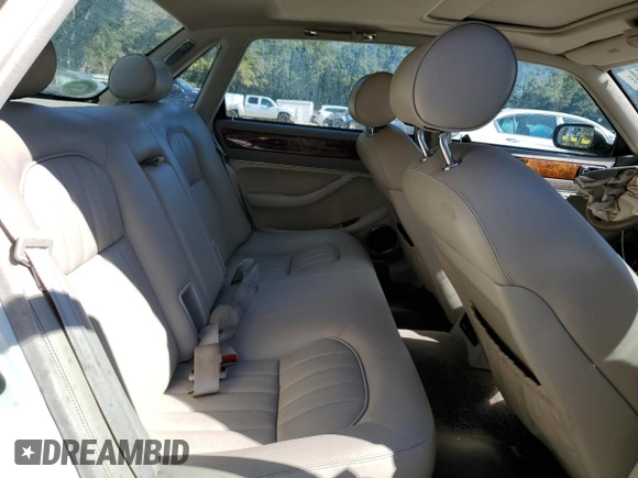 1996 Jaguar XJ with VIN SAJHX1747TC767829, listed as a Copart auction lot 76677444 with Not provided miles and Salvage title. Bid and sale history available at DreamBid. Image 10.