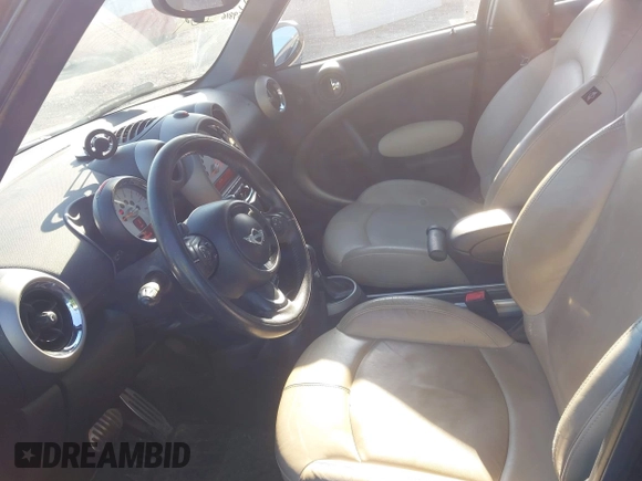 2012 MINI Countryman S with VIN WMWZC5C52CWL62574, listed as a IAAI auction lot 41768196 with 159,816 mi miles and . Bid and sale history available at DreamBid. Image 5.