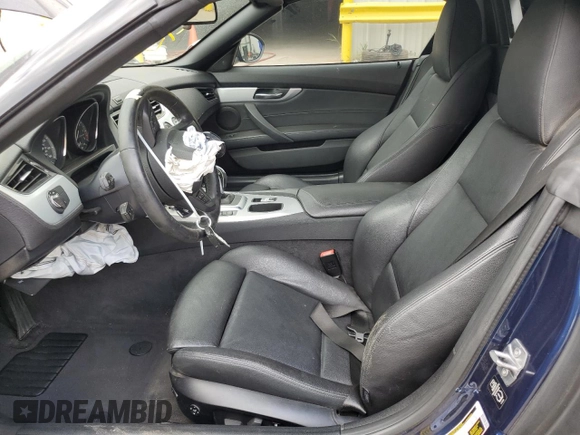 2015 BMW Z4 sDrive35is with VIN WBALM1C59FE634589, listed as a Copart auction lot 67096594 with Not provided miles and Salvage title. Bid and sale history available at DreamBid. Image 7.