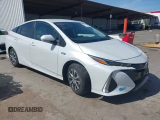 2021 Toyota Prius LE with VIN JTDKAMFP2M3177459, listed as a IAAI auction lot 42093828 with 65,501 mi miles and . Bid and sale history available at DreamBid. Image 1.