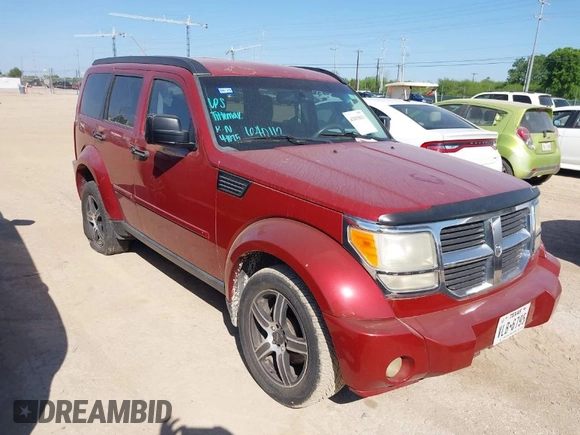 2007 Dodge Nitro SLT with VIN 1D8GT58K77W640112, listed as a IAAI auction lot 42015613 with 220,061 mi miles. Bid and sale history available at carsss.com. Image 1.