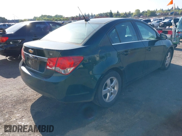 2014 Chevrolet Cruze 1LT with VIN 1G1PC5SB0E7422942, listed as a IAAI auction lot 42107523 with 137,701 mi miles and . Bid and sale history available at DreamBid. Image 4.