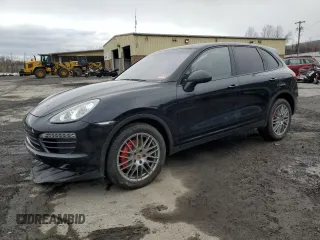 2011 Porsche Cayenne z VIN WP1AA2A29BLA02083, wystawiony jako Copart lot #49099575 z przebiegiem 68 013 mil mil oraz Szkoda całkowita • Salvage title. Historia ofert i sprzedaży dostępna na DreamBid. Obrazek 1.