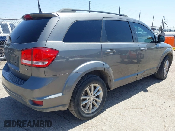 2013 Dodge Journey SXT with VIN 3C4PDCBB4DT563709, listed as a IAAI auction lot 42019033 with 201,188 mi miles. Bid and sale history available at carsss.com. Image 4.