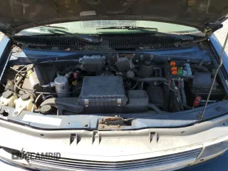 2000 Chevrolet Astro z VIN 1GNDM19WXYB178279, wystawiony jako Copart lot #55323515 z przebiegiem 98 507 mil mil oraz Czysty tytuł • Clean title. Historia ofert i sprzedaży dostępna na DreamBid. Obrazek 12.