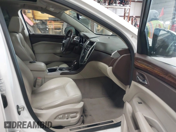 2011 Cadillac SRX Luxury Collection with VIN 3GYFNDEY1BS548452, listed as a IAAI auction lot 41476690 with 156,922 mi miles and . Bid and sale history available at carsss.com. Image 5.