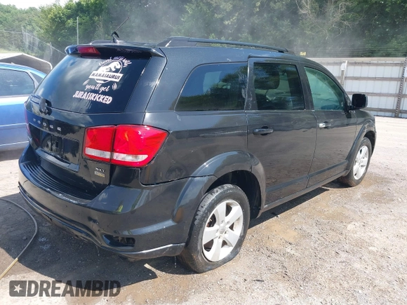2012 Dodge Journey SXT with VIN 3C4PDCBG0CT352887, listed as a IAAI auction lot 42618786 with 201,008 mi miles and . Bid and sale history available at DreamBid. Image 4.