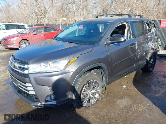 2019 Toyota Highlander LE with VIN 5TDBZRFH7KS978415, listed as a IAAI auction lot 41653130 with 101,245 mi miles and . Bid and sale history available at DreamBid. Image 2.