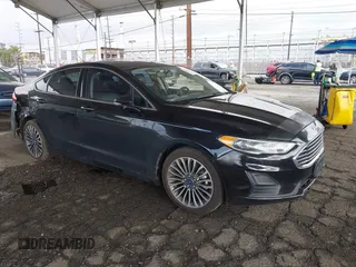 2018 Ford Fusion Titanium with VIN 3FA6P0RU0JR269389, listed as a IAAI auction lot 41736152 with 112,640 mi miles and . Bid and sale history available at DreamBid. Image 1.