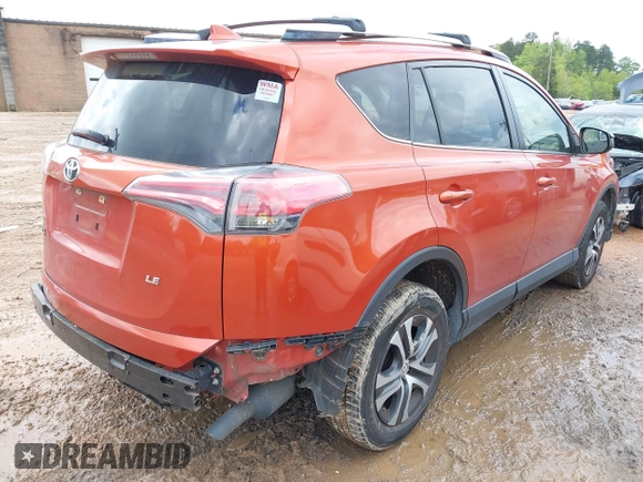2016 Toyota RAV4 LE with VIN JTMZFREV9GJ074360, listed as a IAAI auction lot 42013611 with 87,578 mi miles. Bid and sale history available at carsss.com. Image 4.