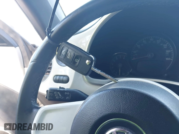 2012 Volkswagen Beetle 2.5L w/Sound/Nav PZEV with VIN 3VWJP7AT1CM619318, listed as a IAAI auction lot 42223291 with 85,989 mi miles and . Bid and sale history available at DreamBid. Image 11.