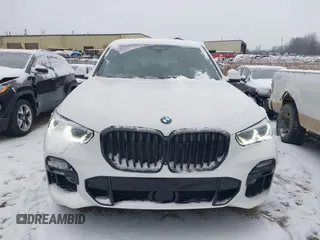 2020 BMW X5 M50i with VIN 5UXJU4C09LLE45658, listed as a IAAI auction lot 41307154 with 69,936 mi miles and . Bid and sale history available at DreamBid. Image 12.
