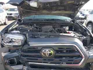 2018 Toyota Tacoma SR with VIN 5TFRX5GN8JX116802, listed as a IAAI auction lot 41879503 with 86,448 mi miles and . Bid and sale history available at DreamBid. Image 10.