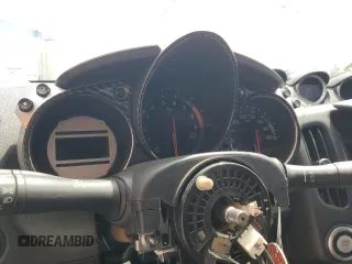2012 Nissan 370Z z VIN JN1AZ4EH1CM562134, wystawiony jako Copart lot #56708065 z przebiegiem Nie podano mil oraz Szkoda całkowita • Salvage title. Historia ofert i sprzedaży dostępna na DreamBid. Obrazek 9.