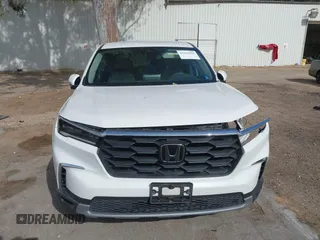 2023 Honda Pilot EX-L z VIN 5FNYG2H47PB015673, wystawiony jako IAAI lot #42192426 z przebiegiem 22 617 mil mil oraz . Historia ofert i sprzedaży dostępna na DreamBid. Obrazek 13.