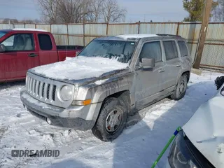 2011 Jeep Patriot Latitude with VIN 1J4NT1GBXBD289758, listed as a IAAI auction lot 41301702 with 215,068 mi miles. Bid and sale history available at carsss.com. Image 2.