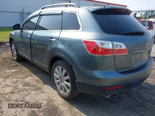 2010 Mazda CX-9 Grand Touring z VIN JM3TB3MV4A0203836, wystawiony jako IAAI lot #42411460 z przebiegiem 156 327 mil mil oraz . Historia ofert i sprzedaży dostępna na DreamBid. Obrazek 3.