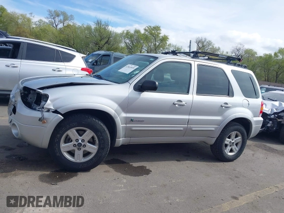 2006 Ford Escape Hybrid with VIN 1FMYU96H76KA14124, listed as a IAAI auction lot 42063449 with 53,055 mi miles and . Bid and sale history available at DreamBid. Image 14.