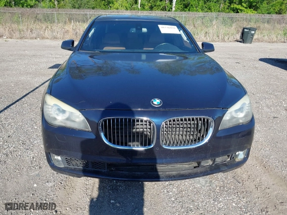 2011 BMW 7 Series 740i with VIN WBAKA4C52BC392112, listed as a IAAI auction lot 41736939 with 125,953 mi miles. Bid and sale history available at carsss.com. Image 6.