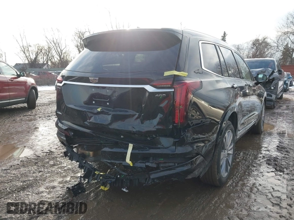 2025 Cadillac XT6 FWD Premium Luxury with VIN 1GYKPCRS6SZ104902, listed as a IAAI auction lot 41565224 with 4,735 mi miles and . Bid and sale history available at DreamBid. Image 17.