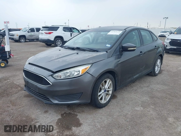 2017 Ford Focus SE z VIN 1FADP3F21HL205009, wystawiony jako IAAI lot #42305641 z przebiegiem 75 160 mil mil oraz . Historia ofert i sprzedaży dostępna na DreamBid. Obrazek 2.