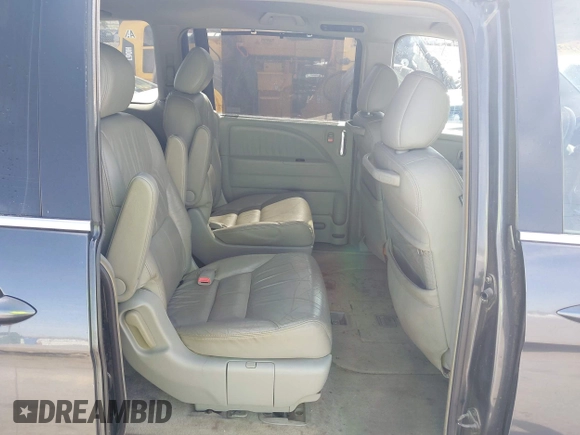 2005 Honda Odyssey TOURING with VIN 5FNRL38855B091754, listed as a IAAI auction lot 42131326 with 258,635 mi miles. Bid and sale history available at carsss.com. Image 8.