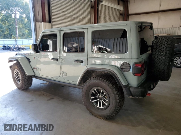 2024 Jeep Wrangler Rubicon X with VIN 1C4RJXFG5RW287542, listed as a Copart auction lot 72682924 with 5,792 mi miles and Salvage title. Bid and sale history available at DreamBid. Image 2.