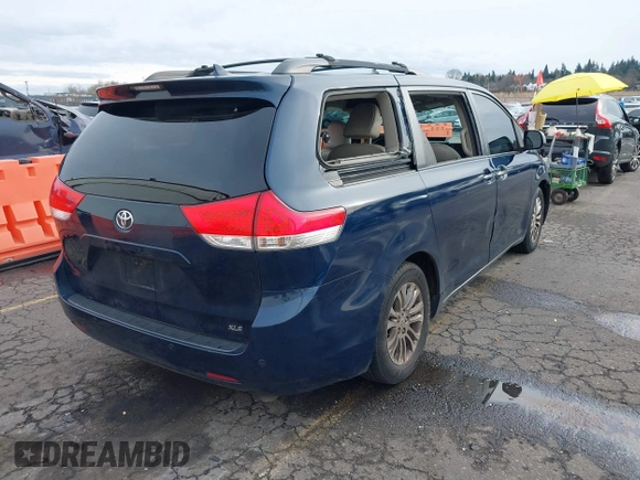 2011 Toyota Sienna XLE AAS with VIN 5TDYK3DCXBS113103, listed as a IAAI auction lot 41505972 with 170,919 mi miles and . Bid and sale history available at DreamBid. Image 4.